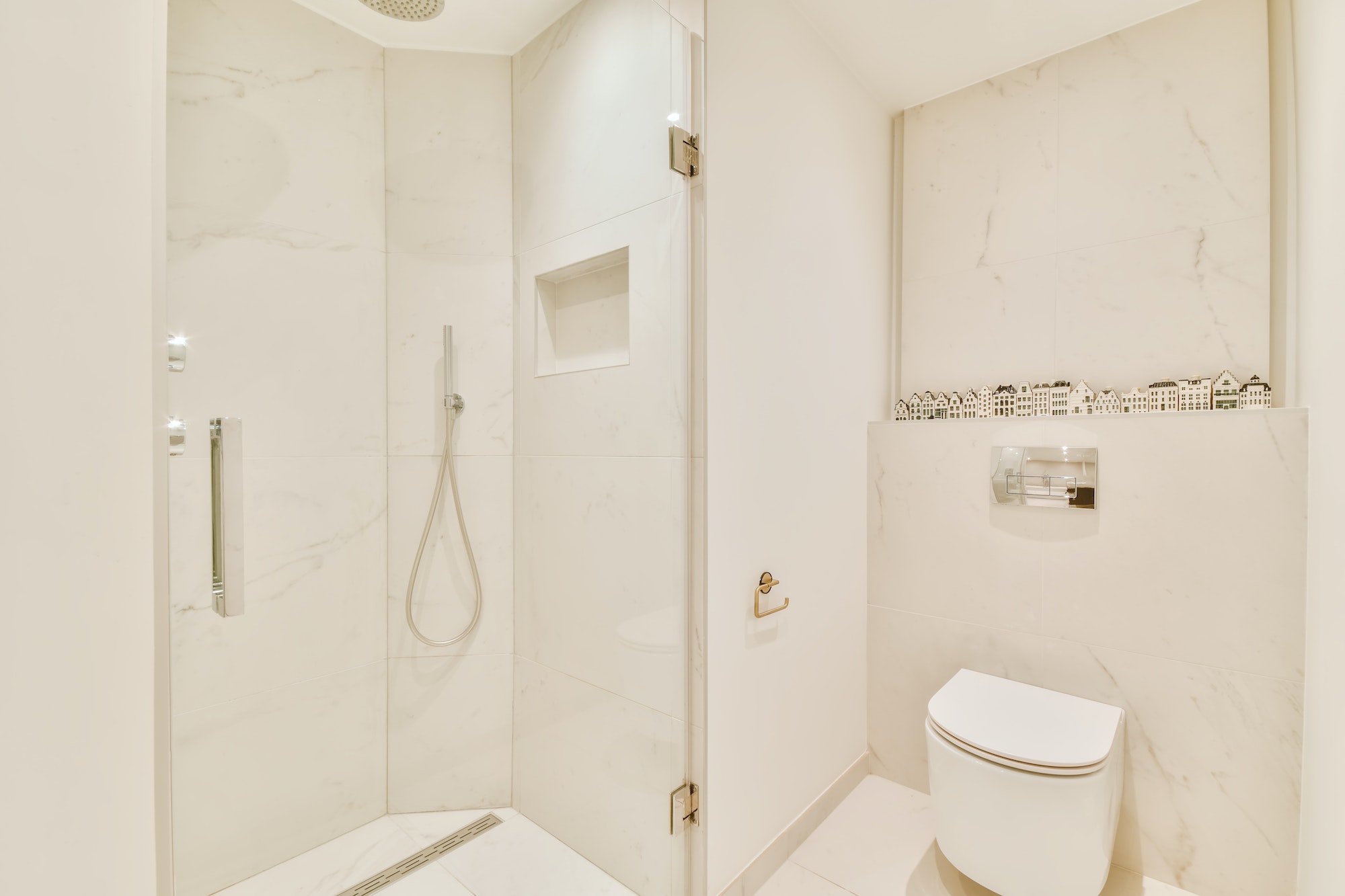 Bathroom with built-in shower head in the shower